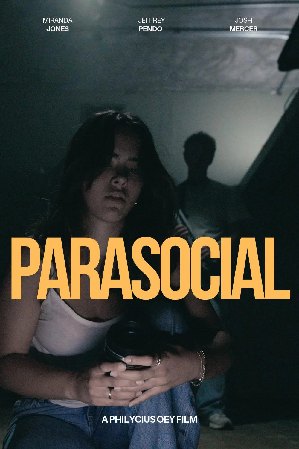 Parasocial poster: a woman sits on a dark staircase as a figure stands behind her